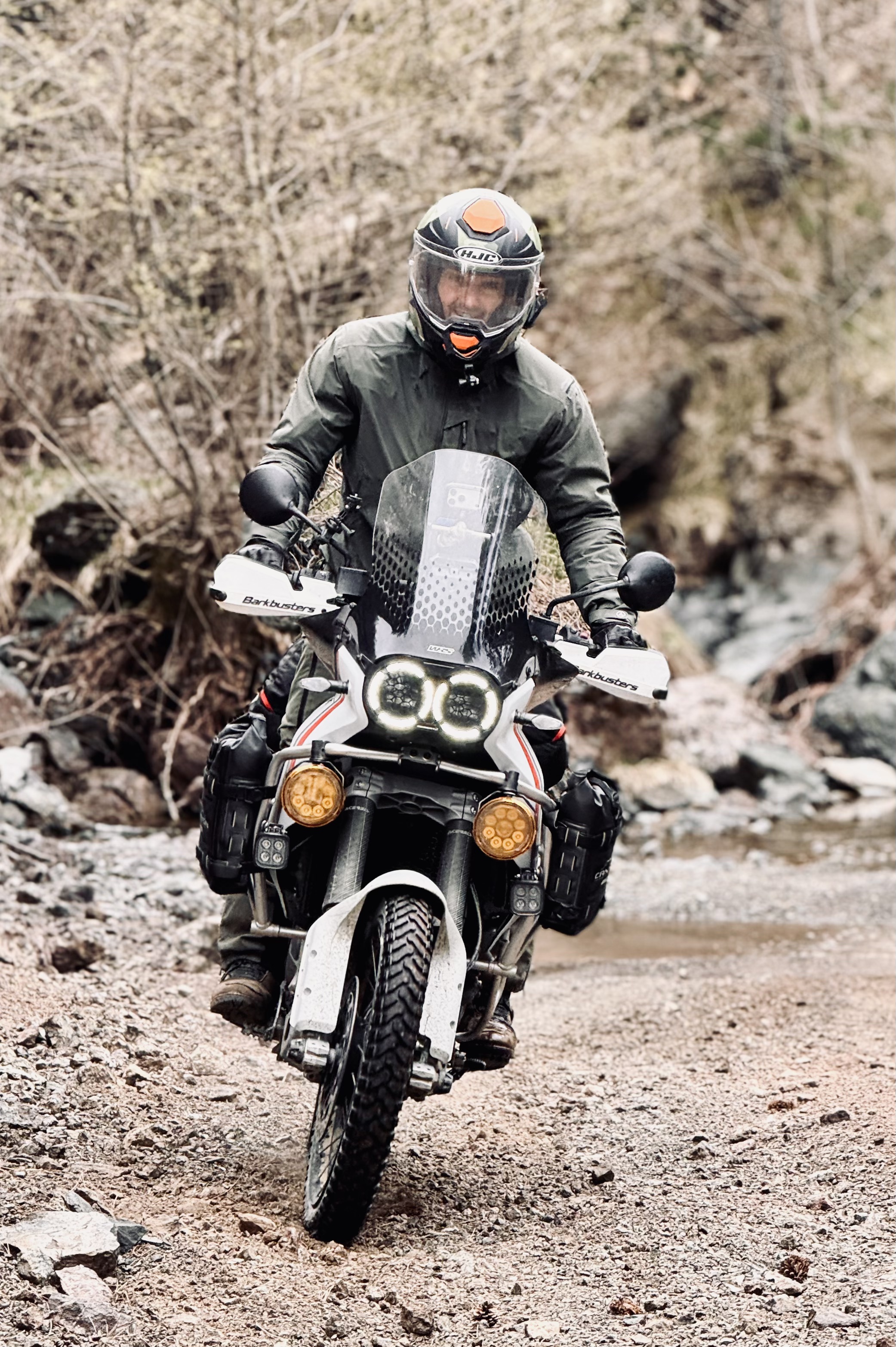 Lil Berisha — TAD Adventure Lead Guide riding on rocky Kosovo river trail