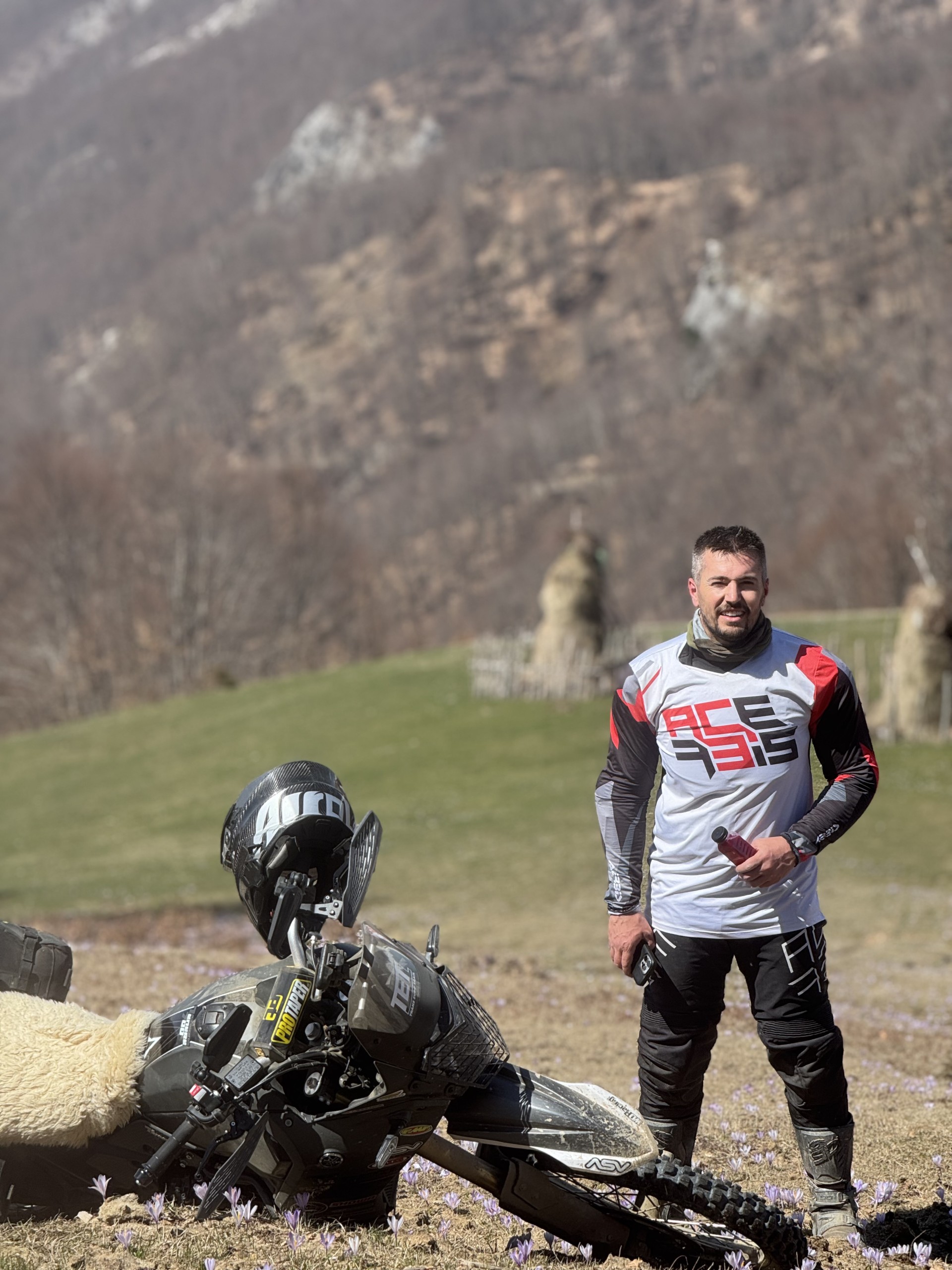 Qendrim Graiçevci — TAD Adventure trail scout and TET Linesman with fallen bike and sheep in Kosovo mountains
